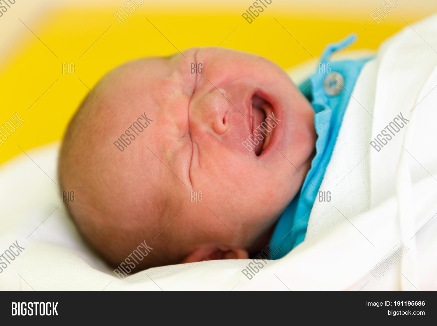 crying newborn baby infant in the hospital the first hours of