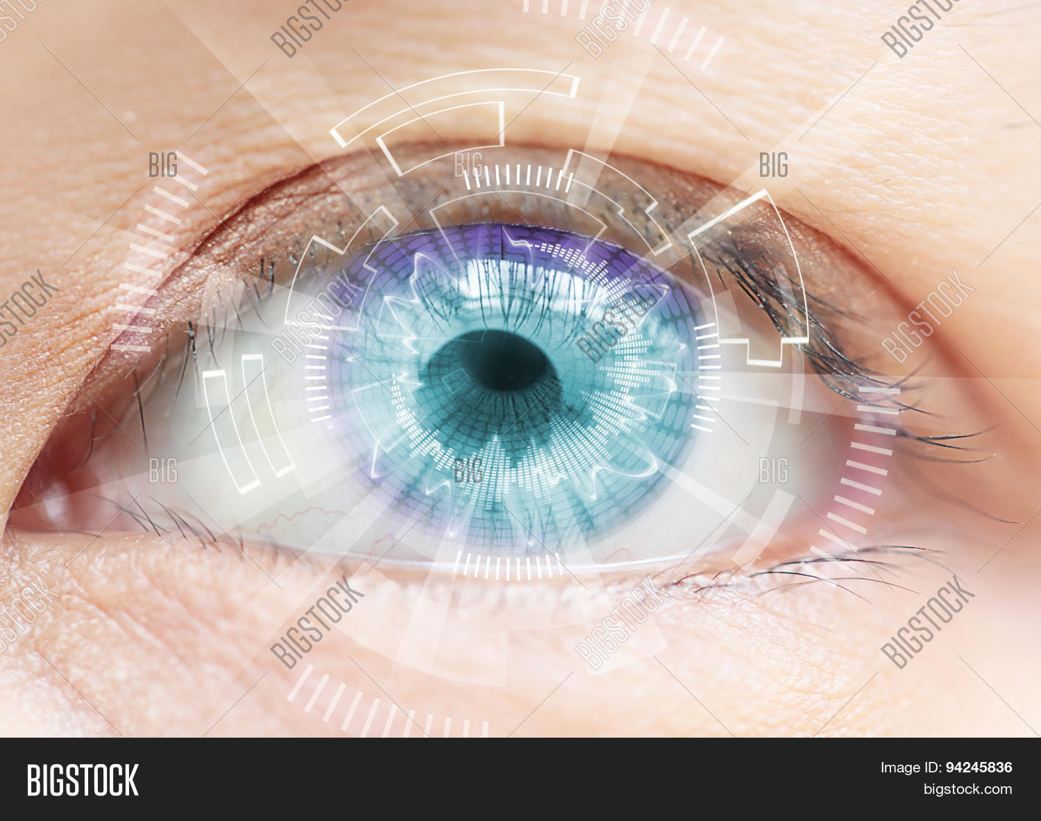 close-up of womans blue eye.