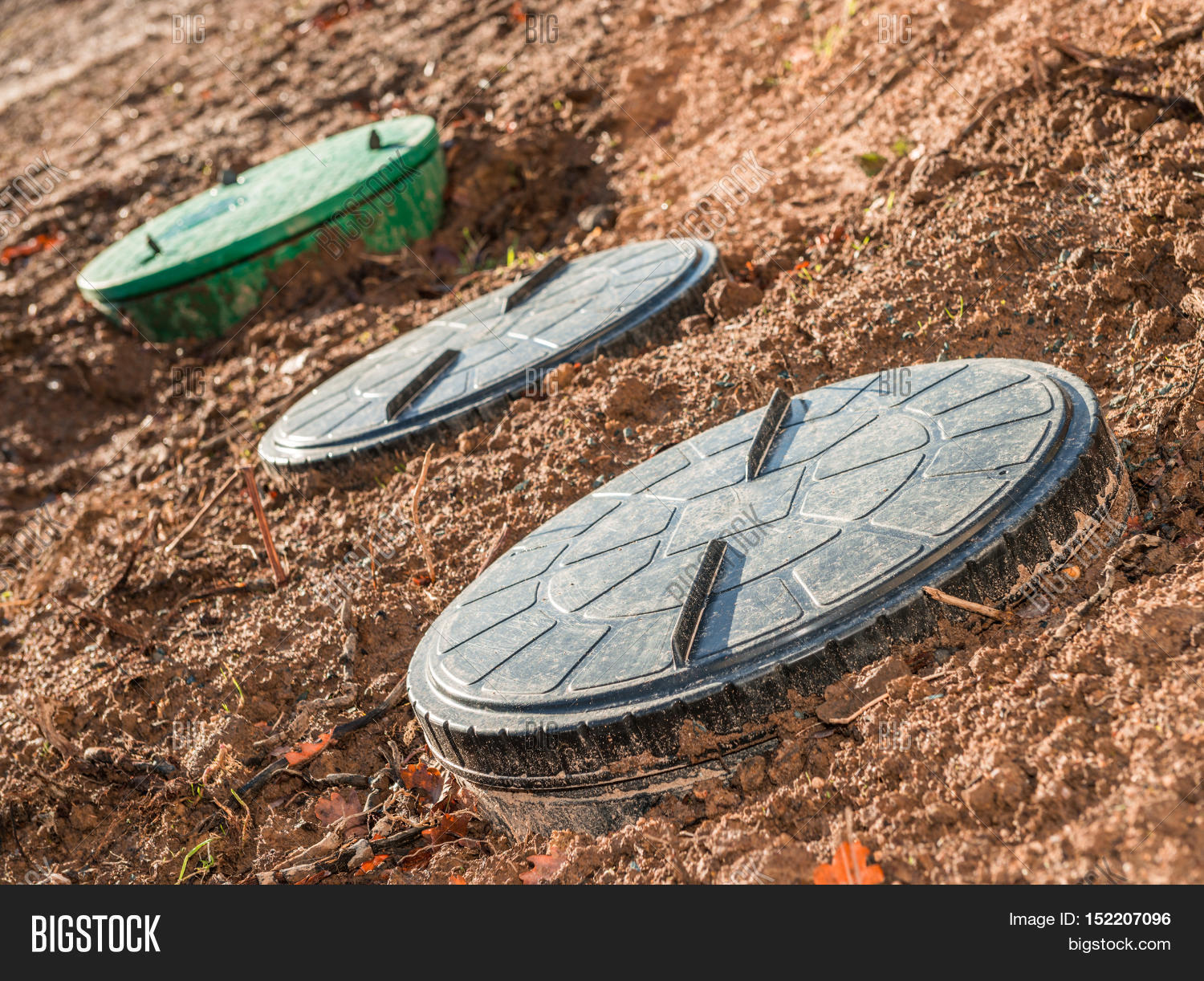 close up on three septic tanks for domestic wastewater treatment