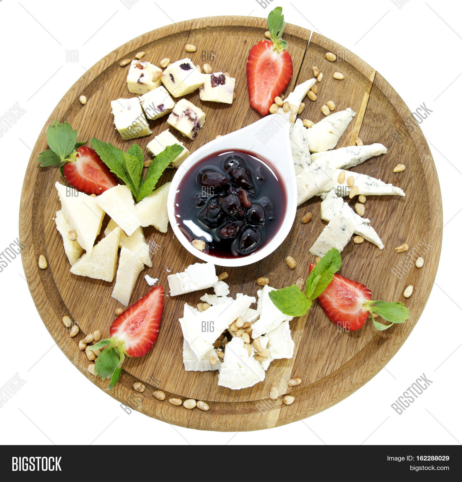 cheese plate with several varieties of cheese in the restaurant