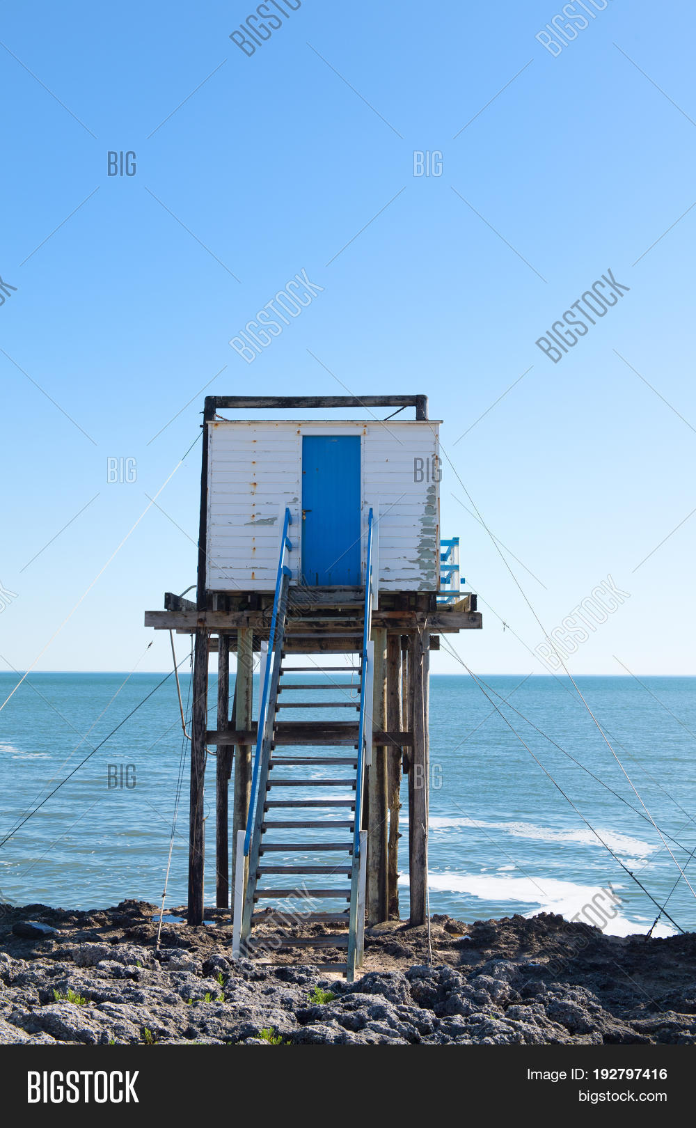 wooden fisherman huts on poles at the coast from the french