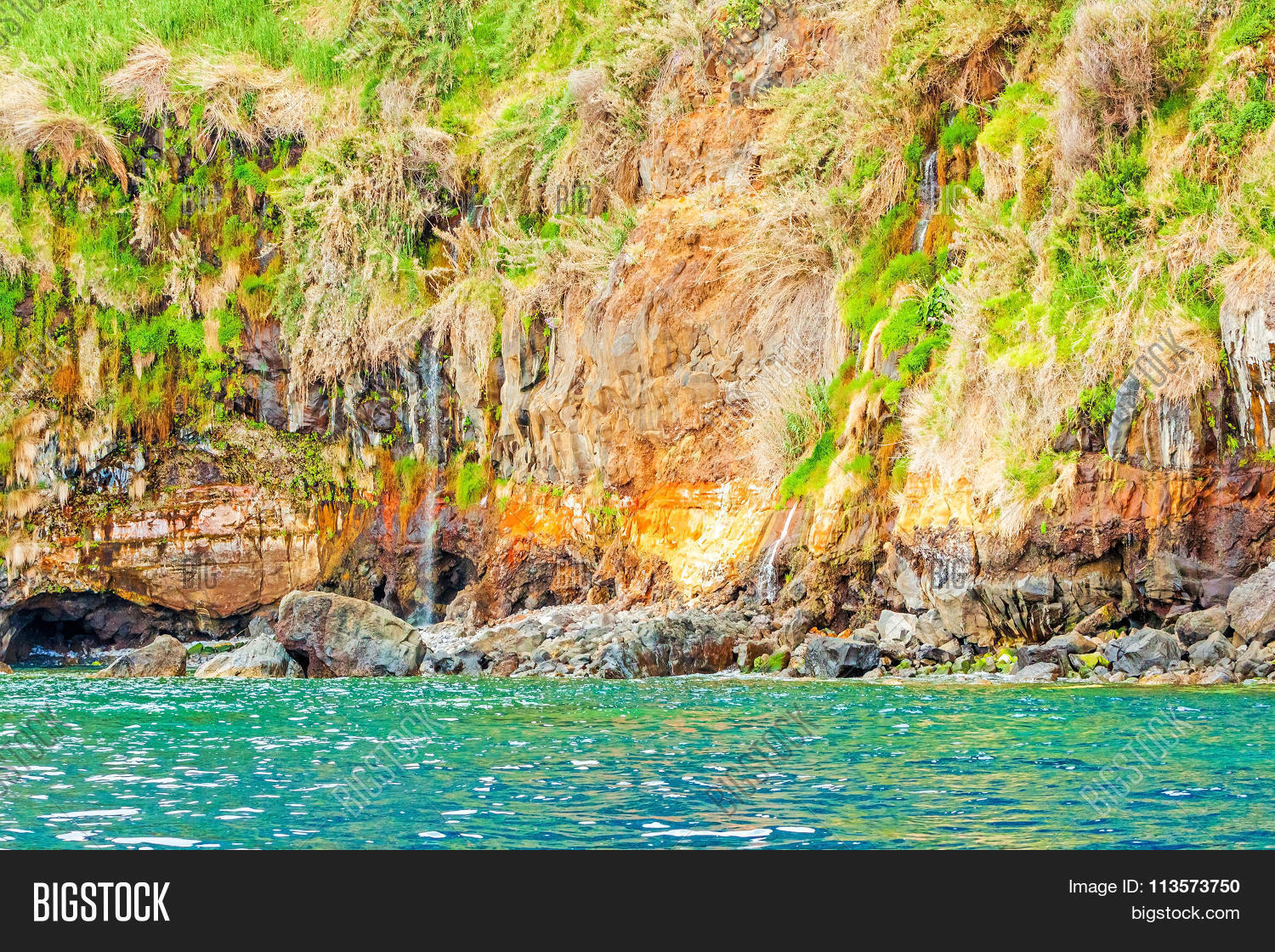 colorful rocky cliff coast of madeira between jardim do mar and