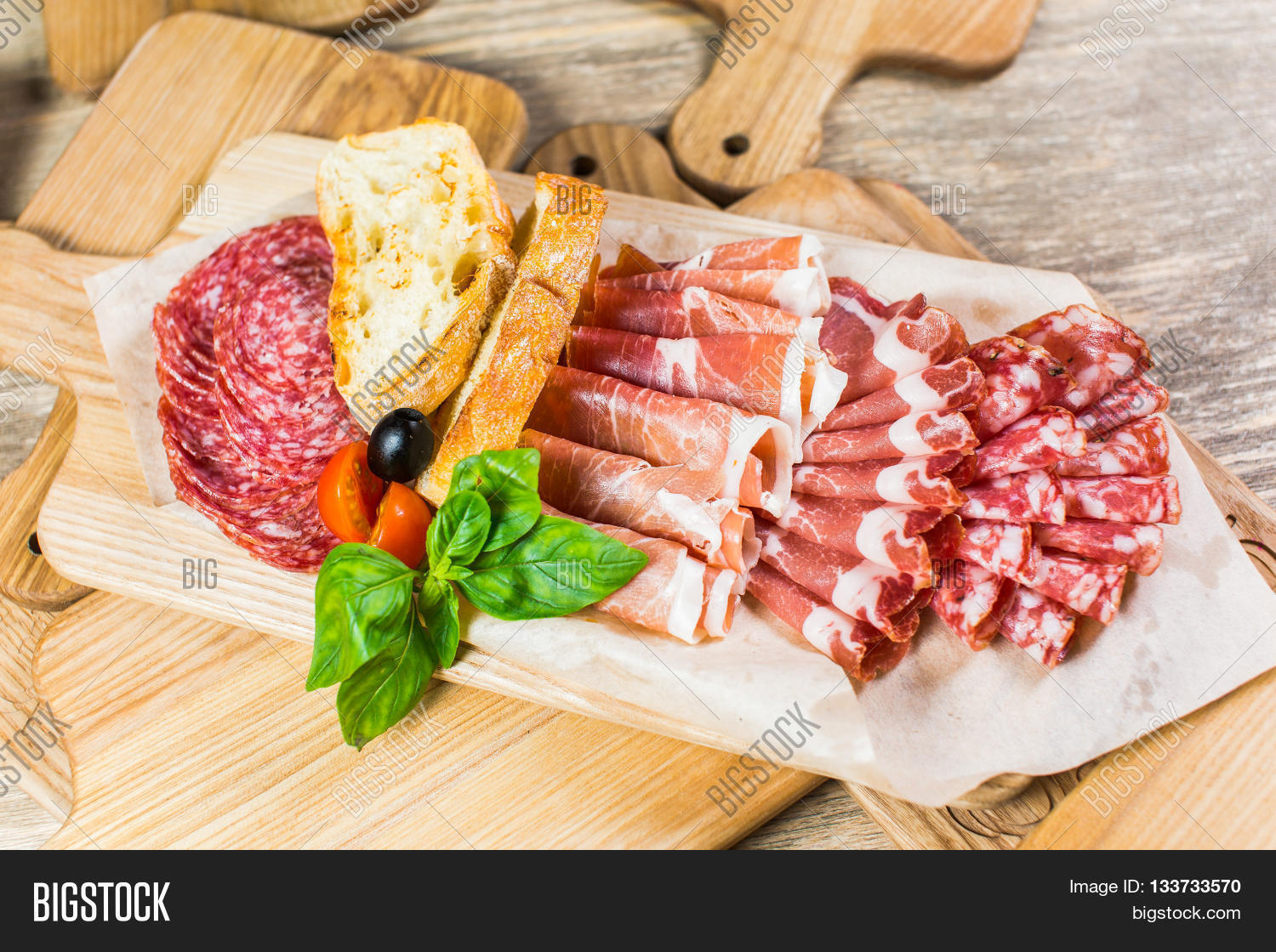 delicious and tasty meat dishes. ham salami prosciutto.