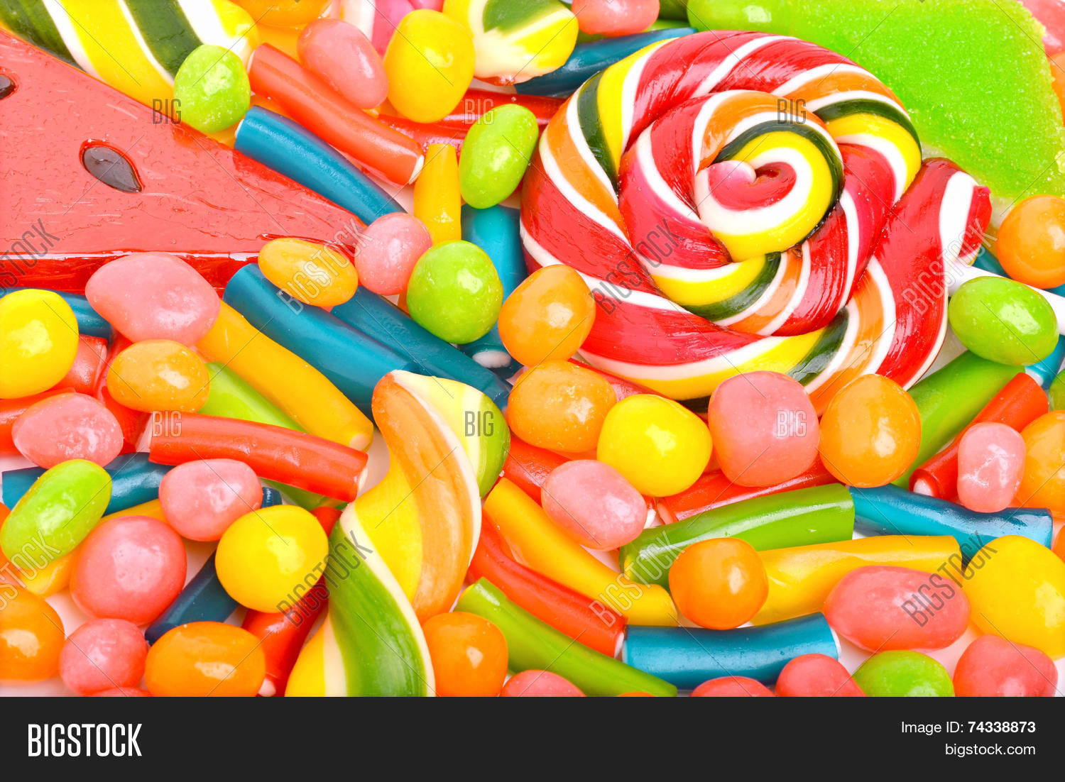 bright sweets lollipops dragee candies and jelly sweets