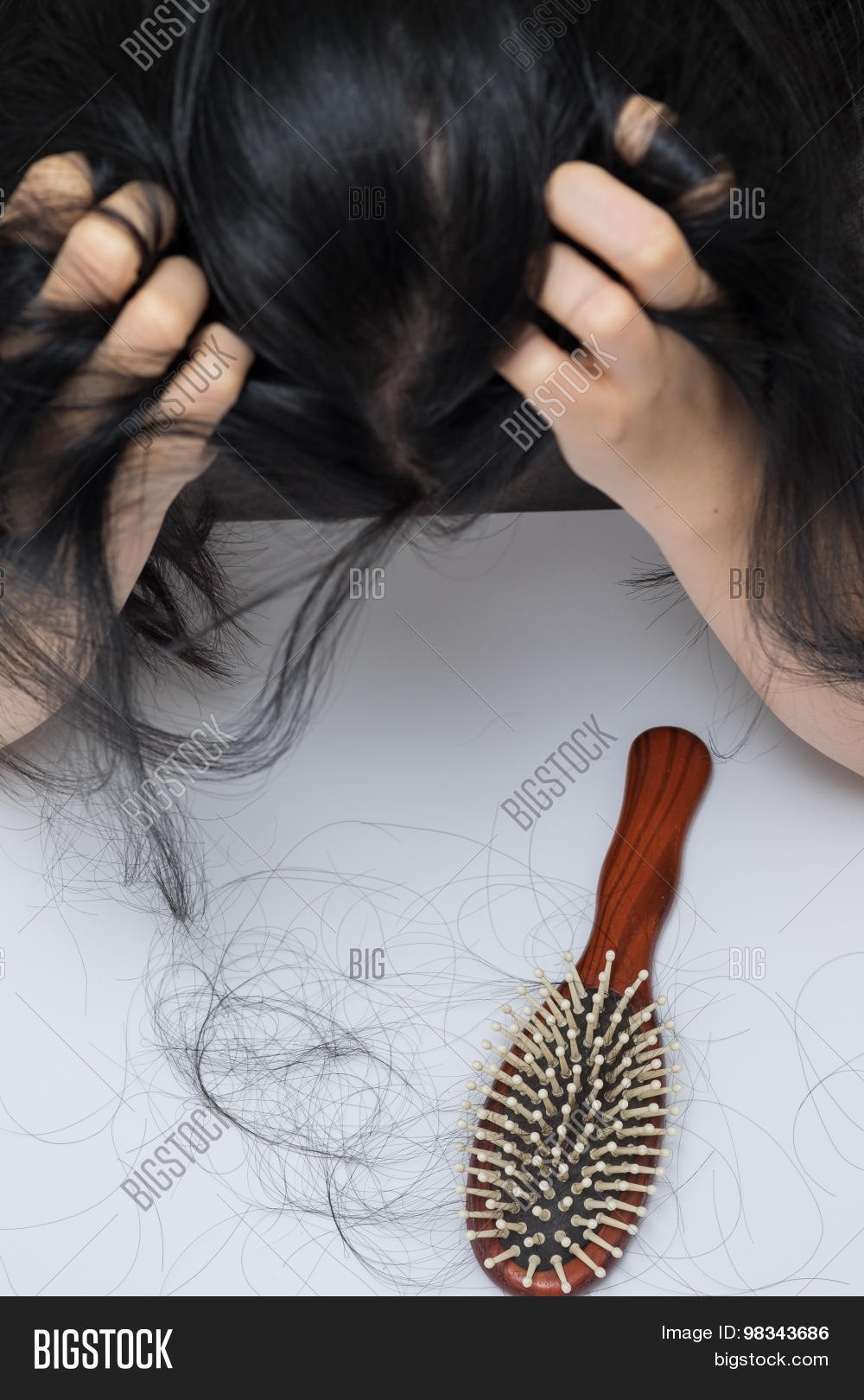 woman hair loss problem she stress looking on her hair loss in