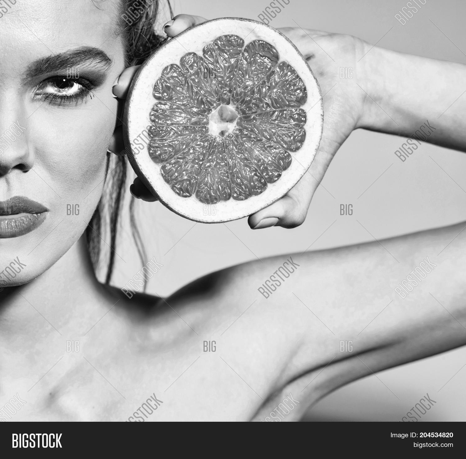 pretty girl or sexy woman with blue lips stylish makeup on