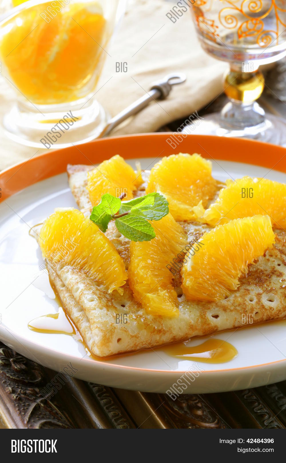 "crpes suzette" pancakes with orange and sweet sauce