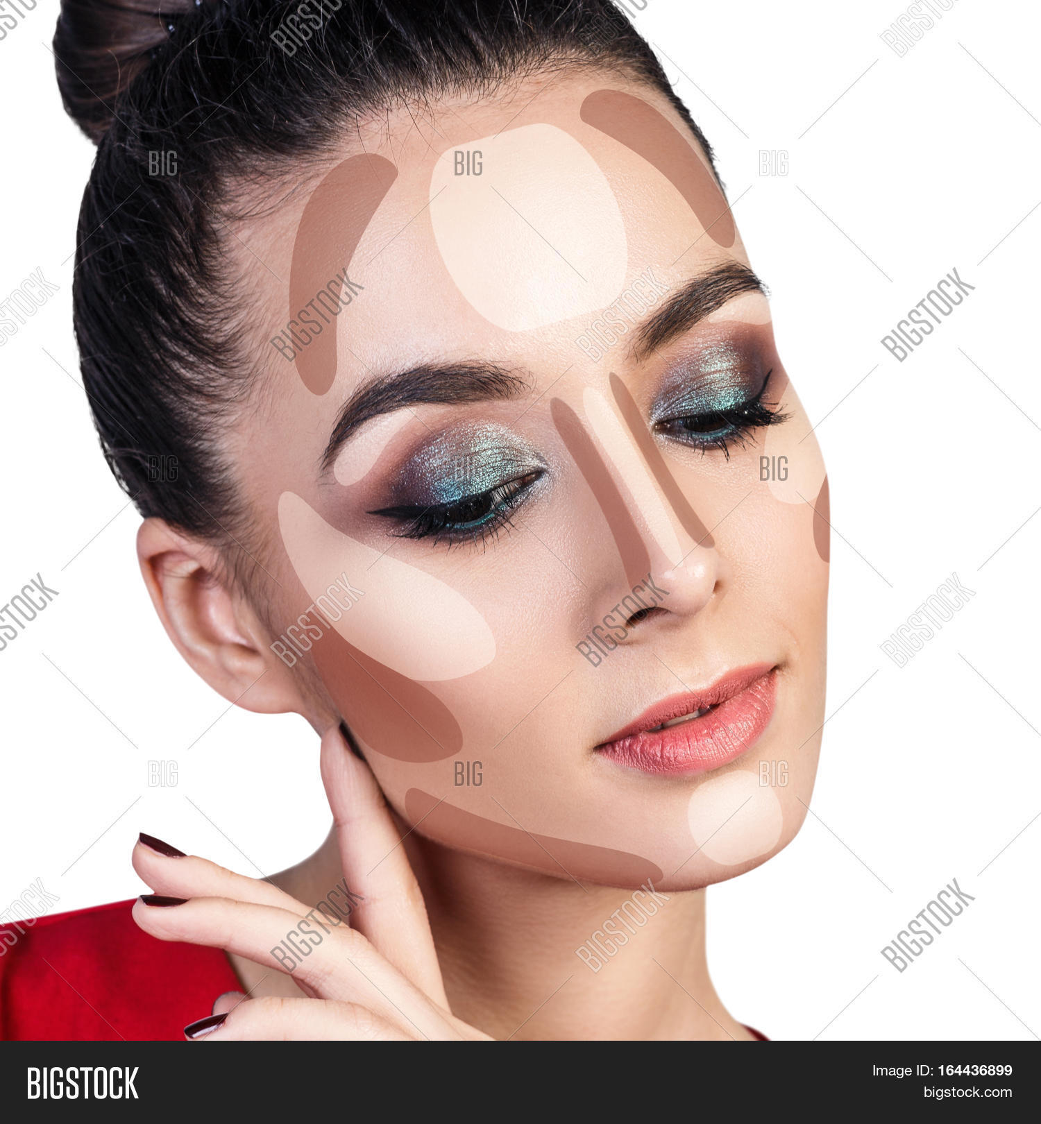 young womans face with contouring makeup.