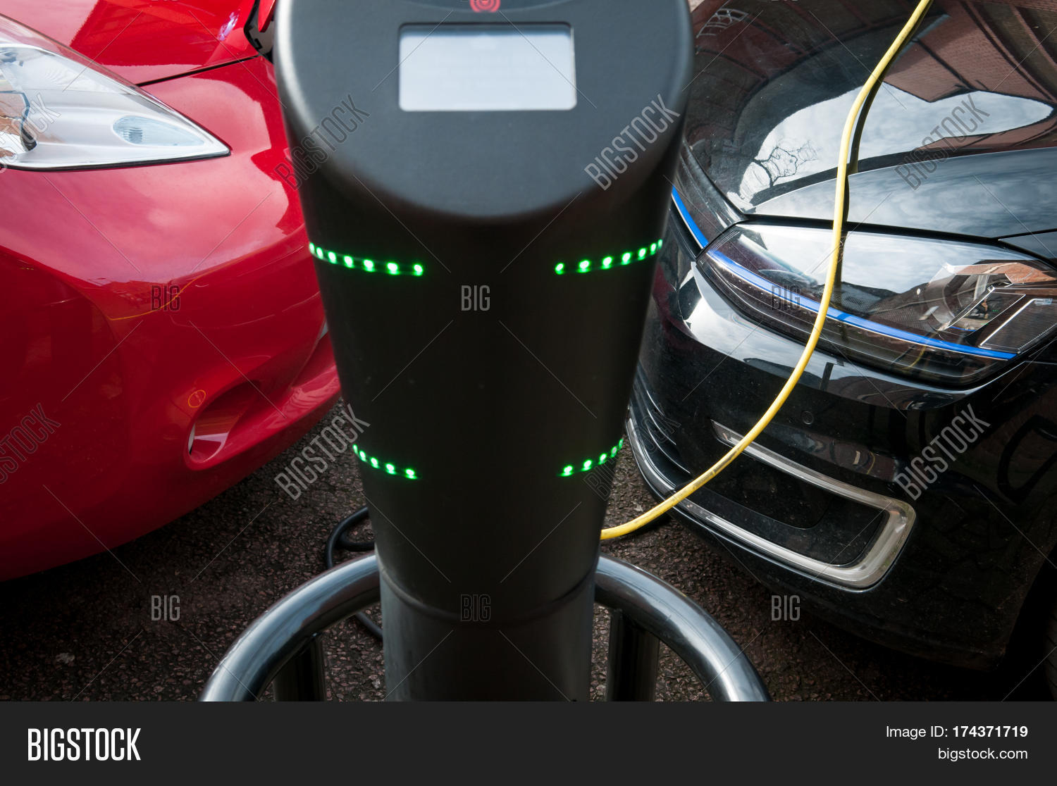 electric car charging to refuel at the charge station