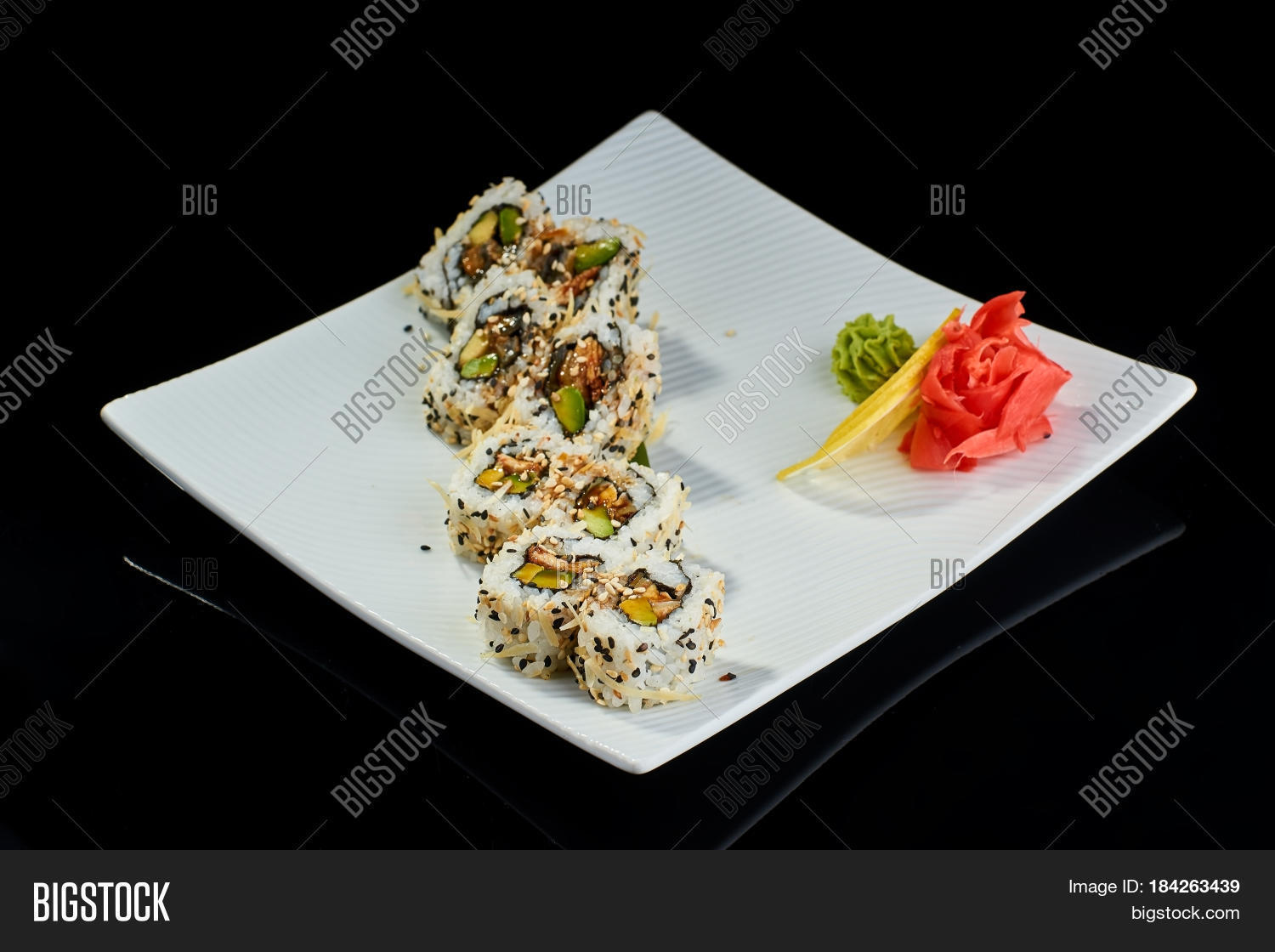 sushi roll with spicy eel fish with parmesan cheese with vasabi