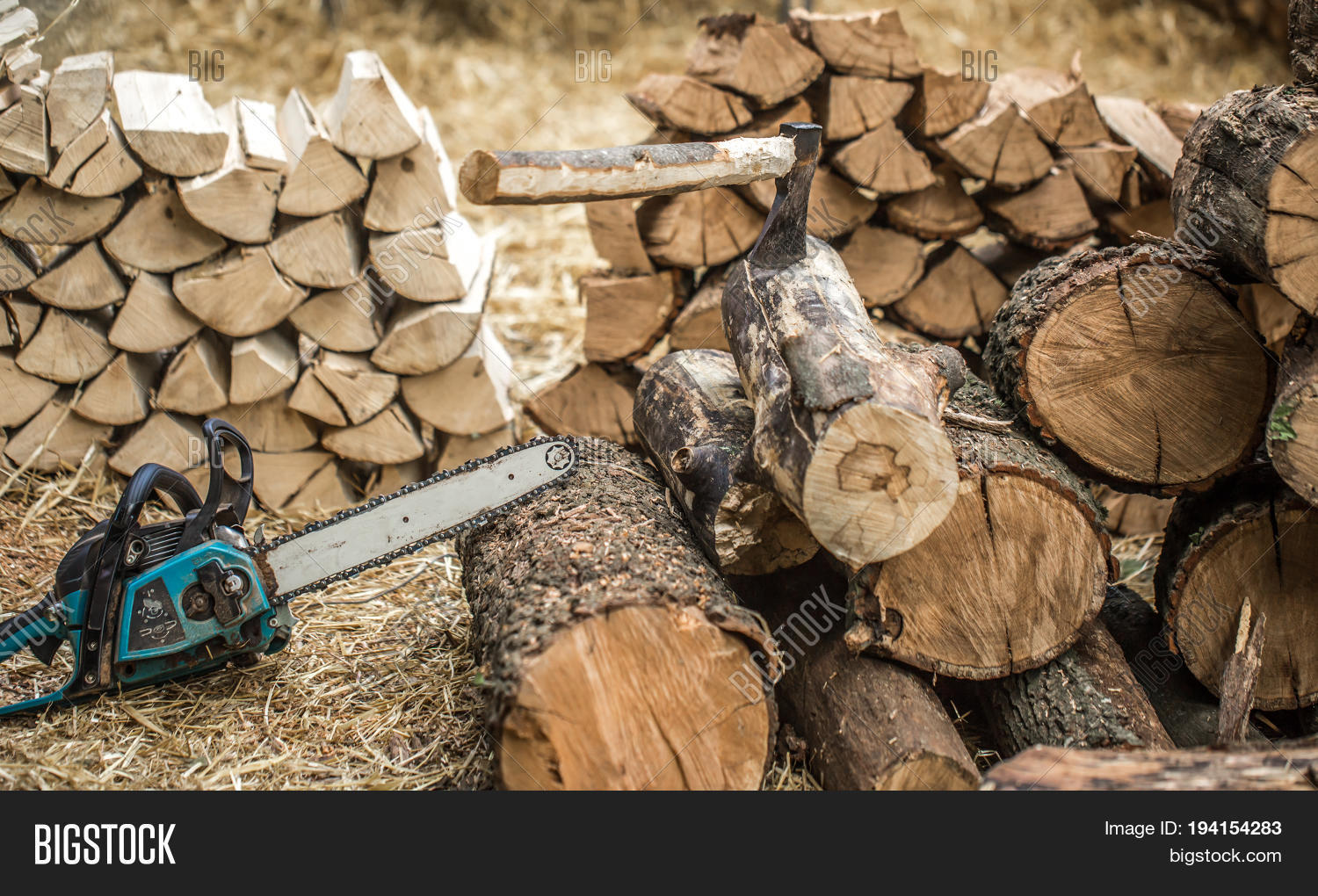 man chopping wood with a chainsaw close-up