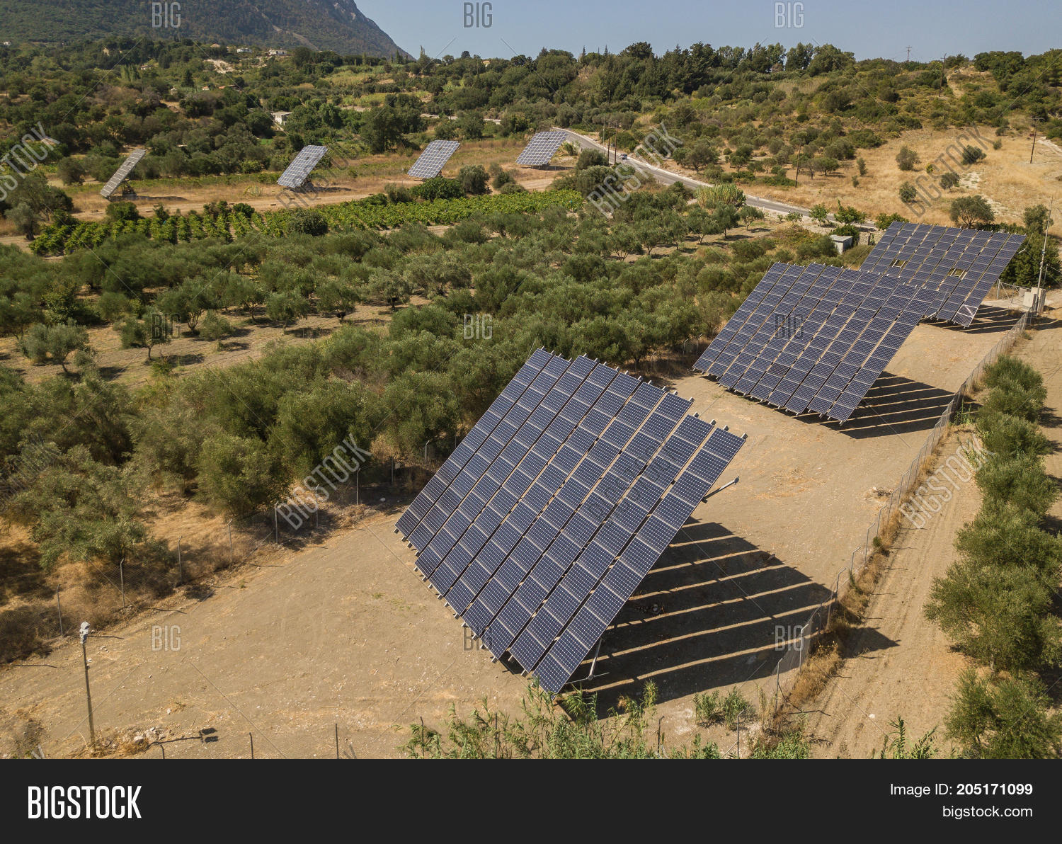aerial view of solar pannels in countryside