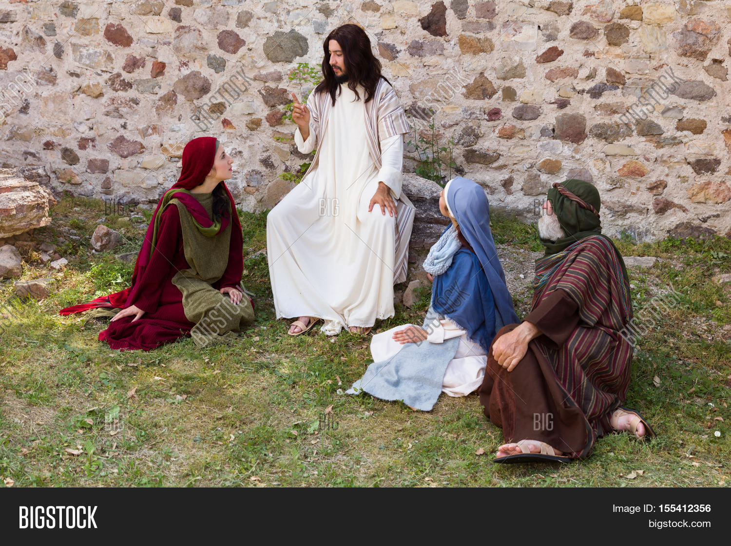 jesus preaching to a group of people - historical reenactment