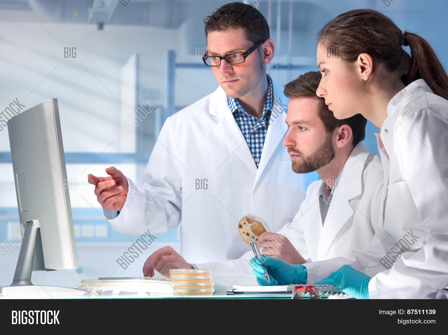 group of scientists working at the laboratory