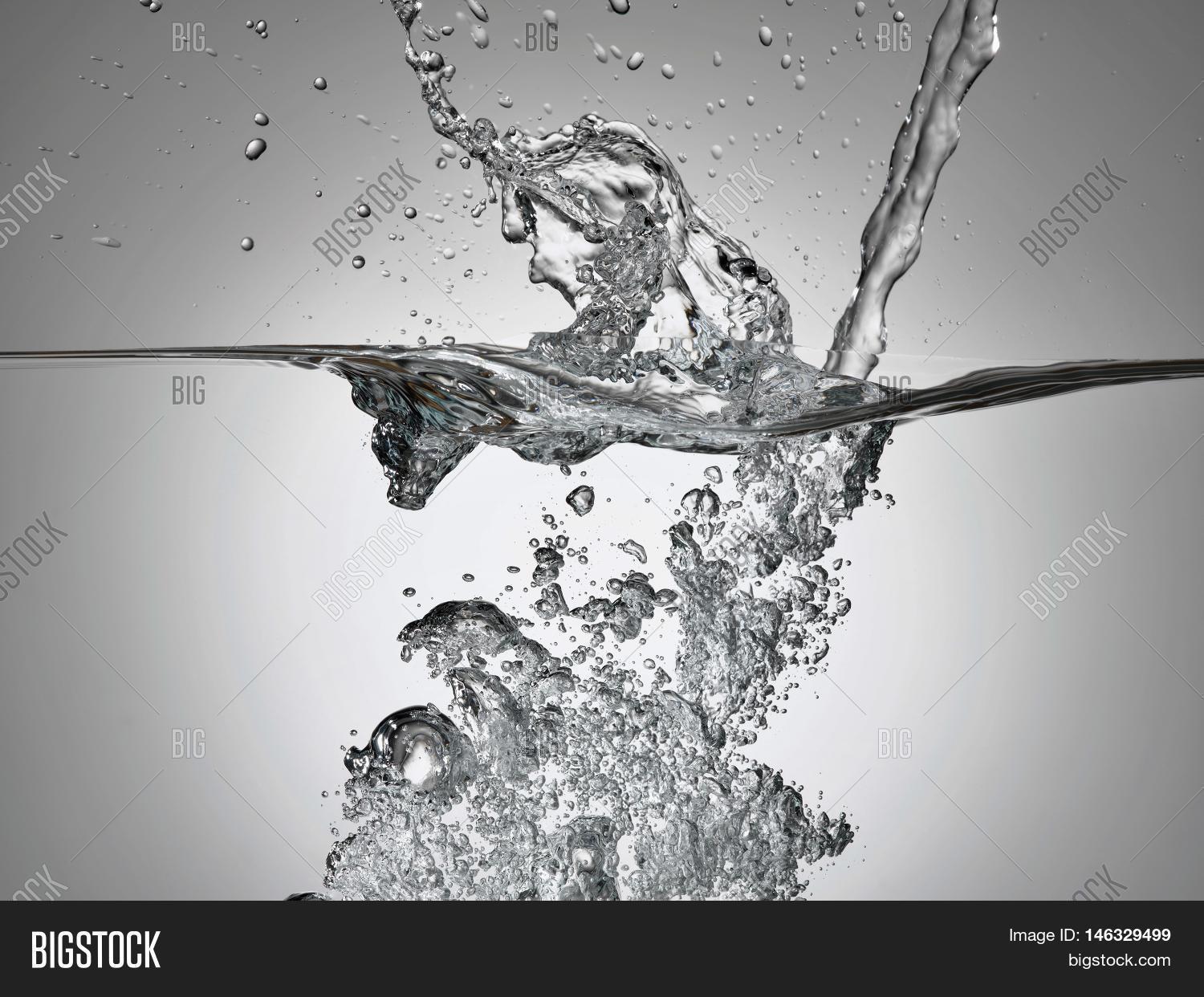 jet splashing into water surface view