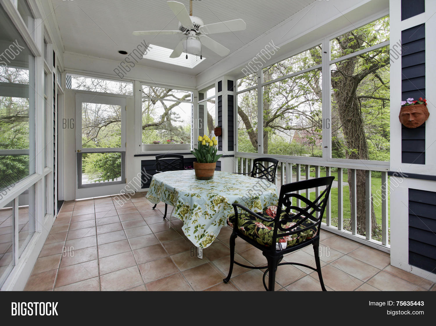porch in suburban home with tile floor