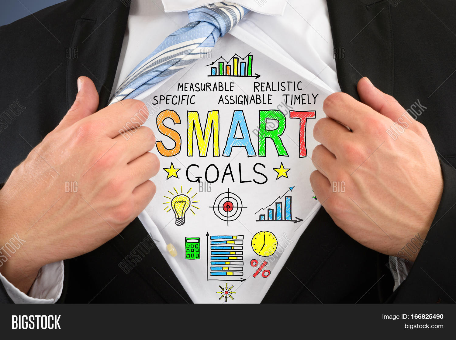 close-up of businessperson opening his shirt showing smart goal