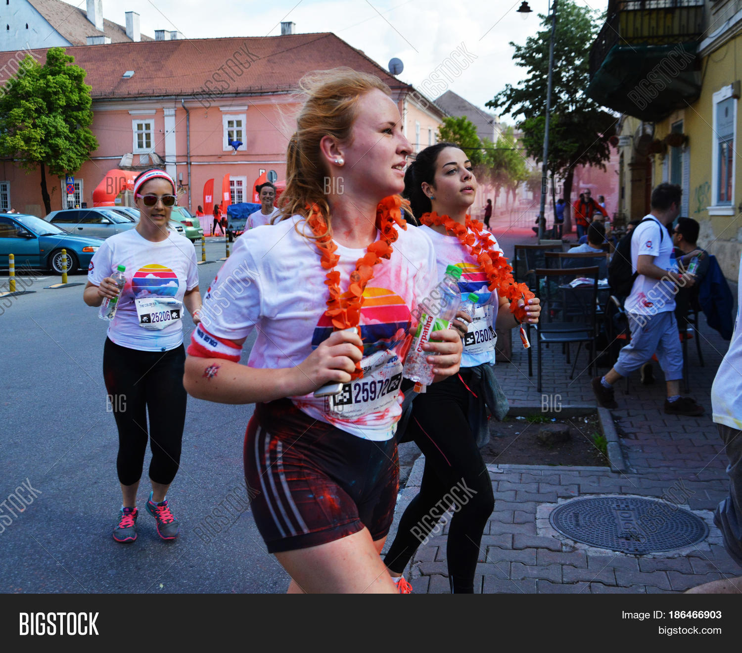 napoca romania - may 14 2017: beautiful young girls splashed
