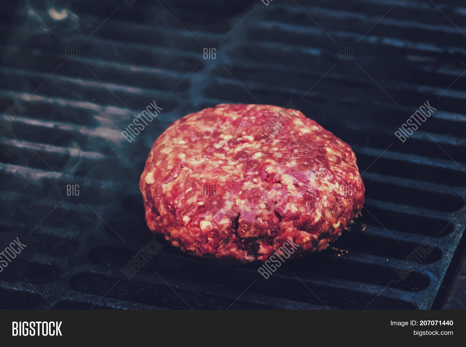 close-up of beef cutlet for burger fried in grill cutlet cuddle
