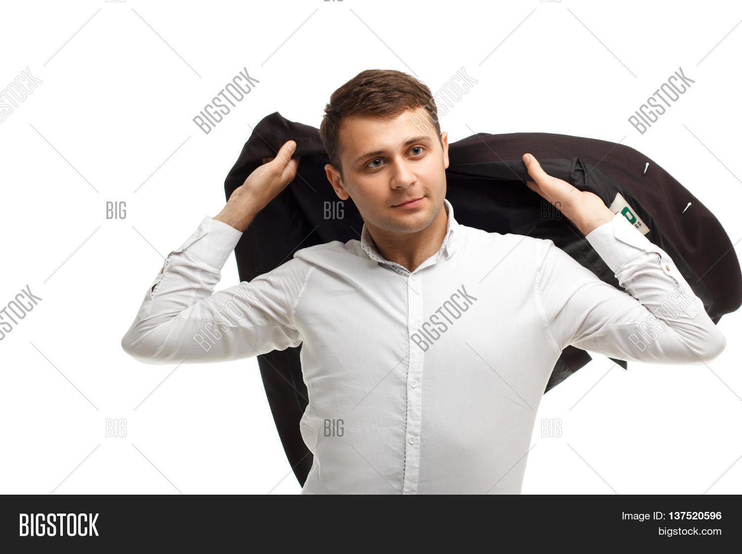 portrait of handsome businessman wearing white shirt threw his