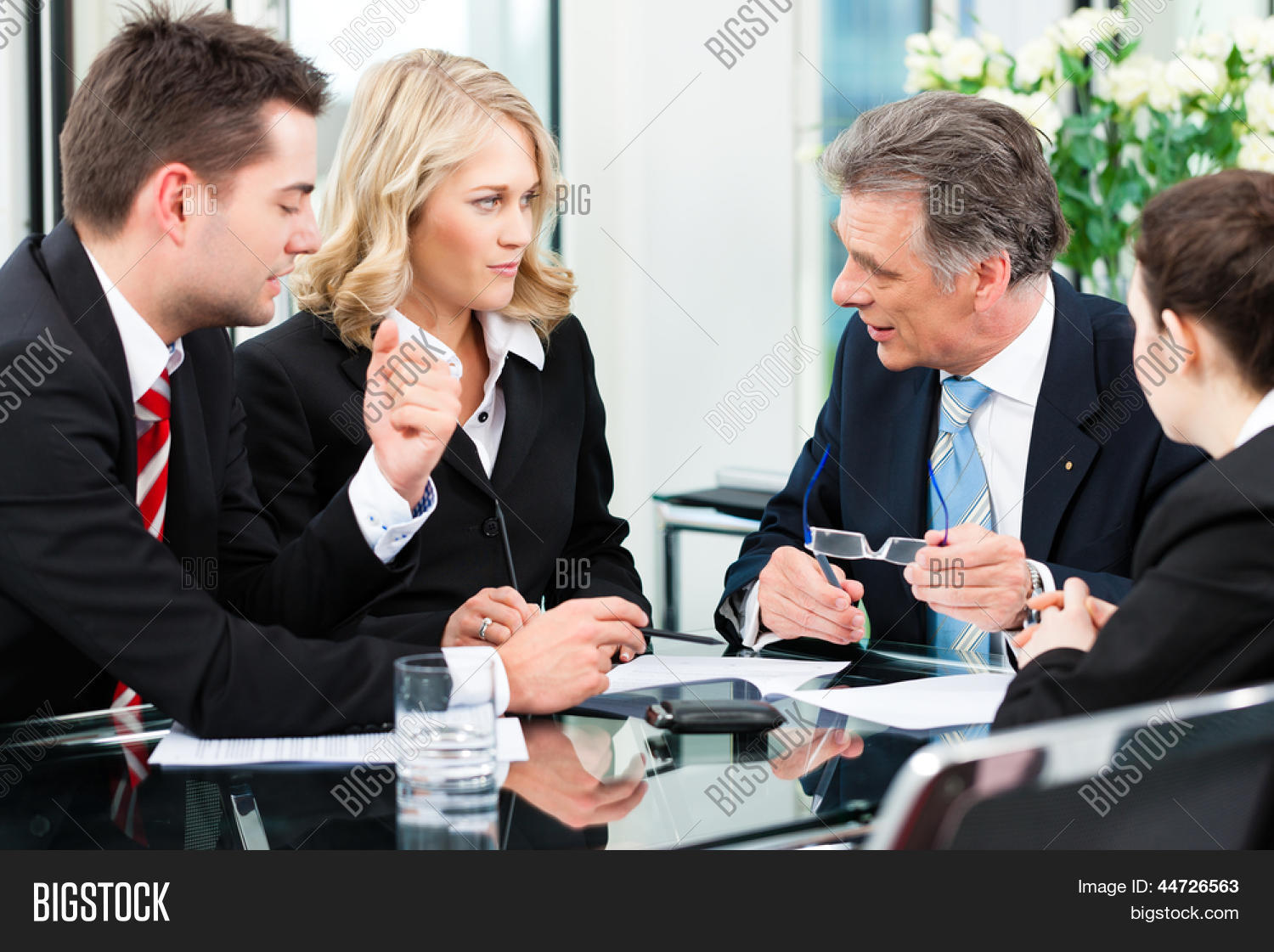 business - meeting in an office, the businesspeople are