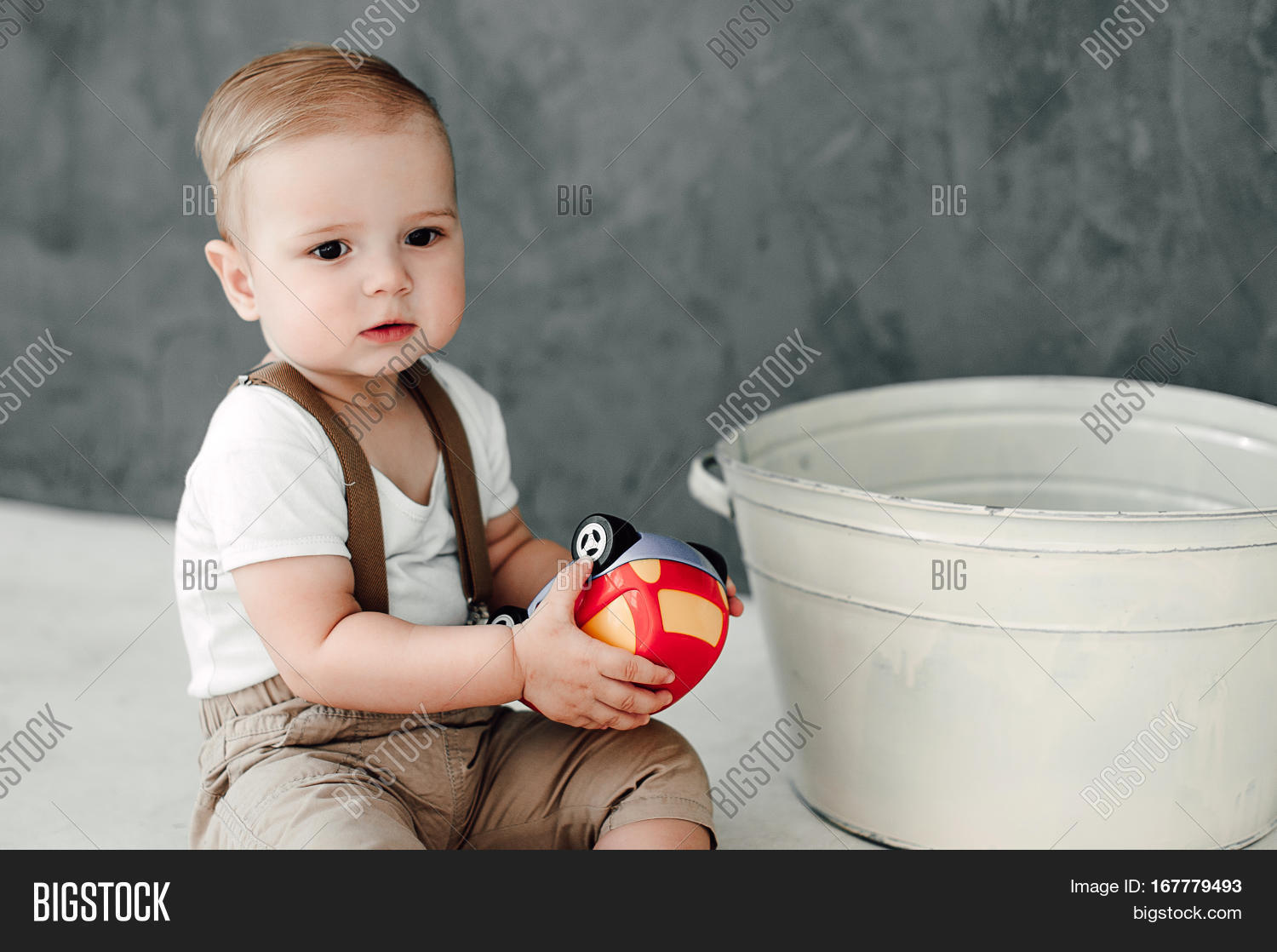 portrait of lovely little boy happy smiling celebrating 1 year