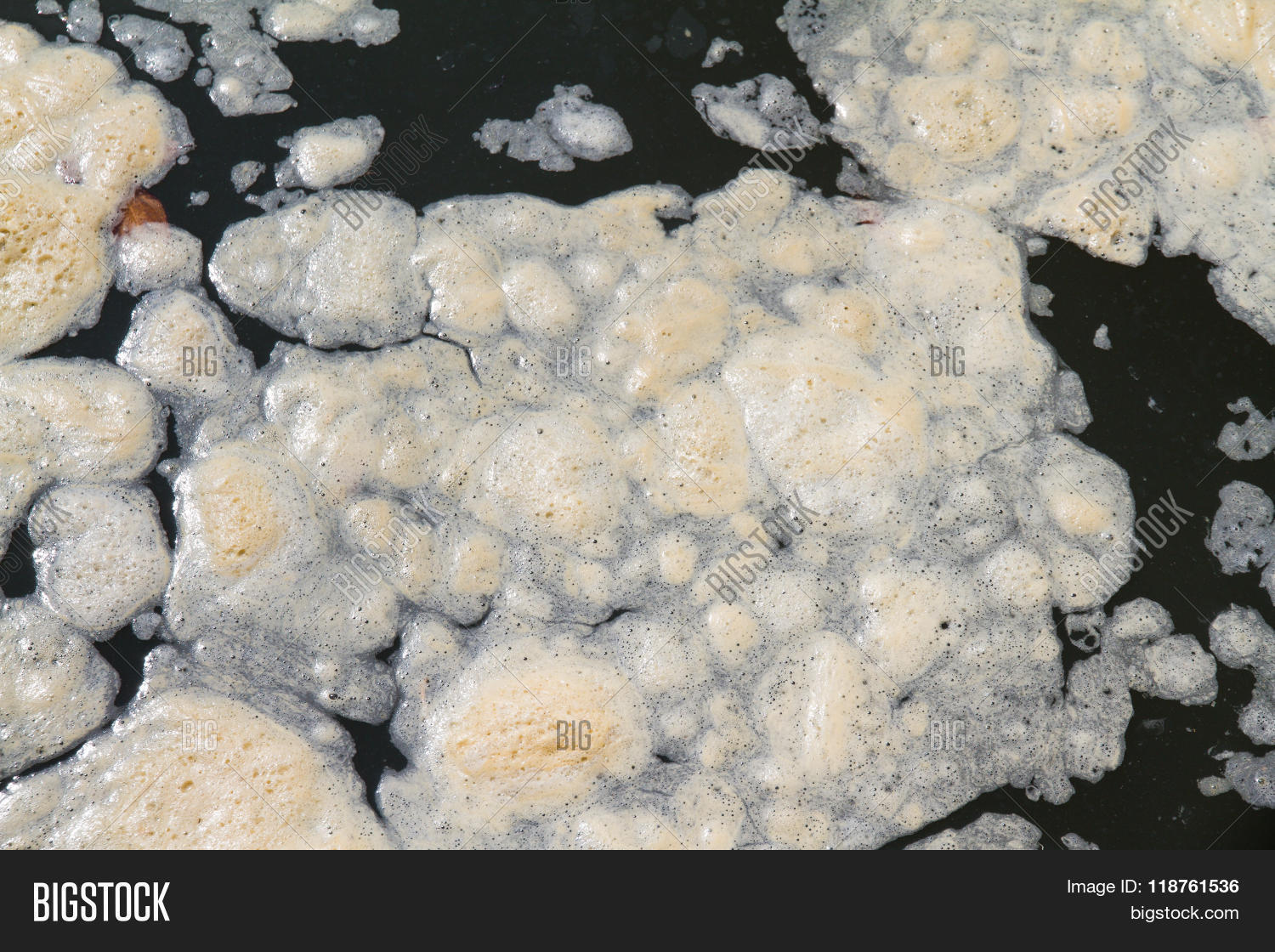 dirty toxic scum industry effluent water in the river.