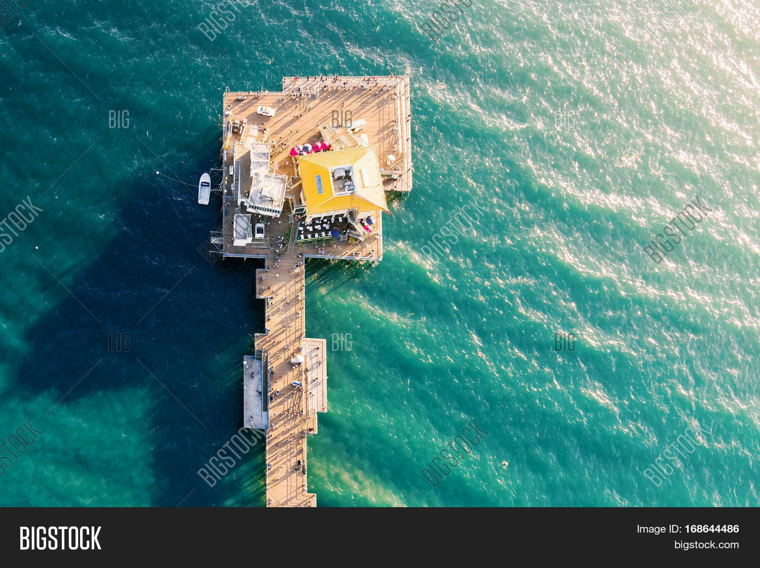 aerial view of a coastal pier in the ocean