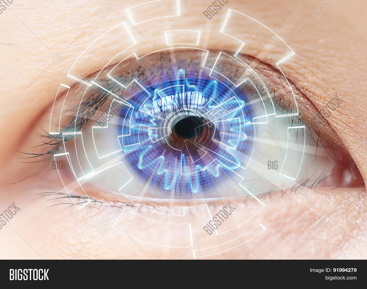 close-up of womans blue eye.