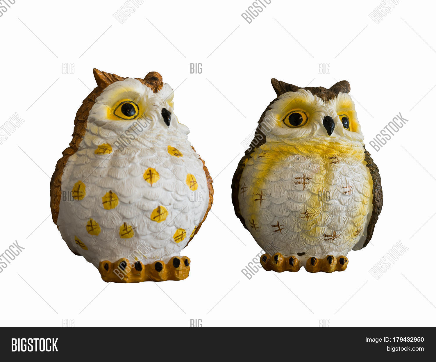 statuette of a cute owl on a white background.