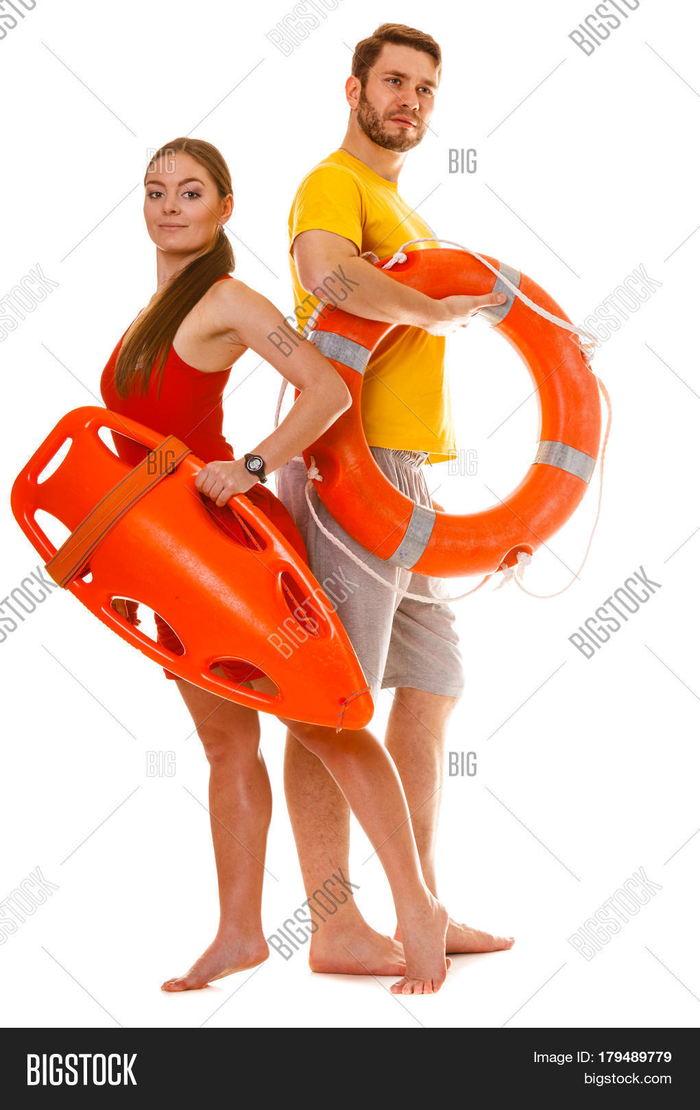 lifeguards with rescue tube and ring buoy lifebuoy.